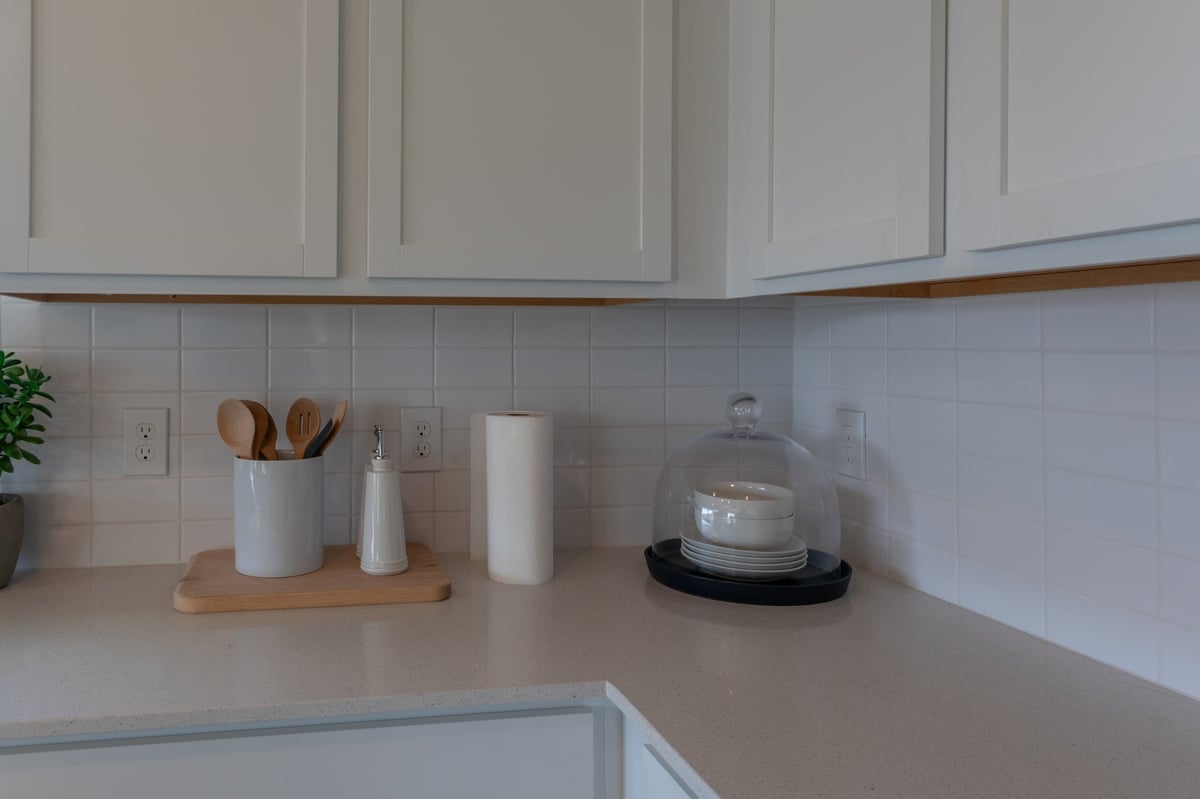 White Corian solid surface countertop restored in a Manhattan apartment kitchen