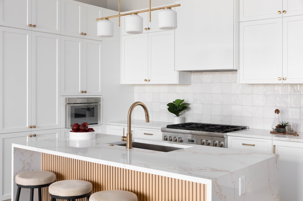 Professional marble countertop repair, polishing and sealing in Westchester County NY by Refresh Countertops — luxury kitchen with restored waterfall marble island